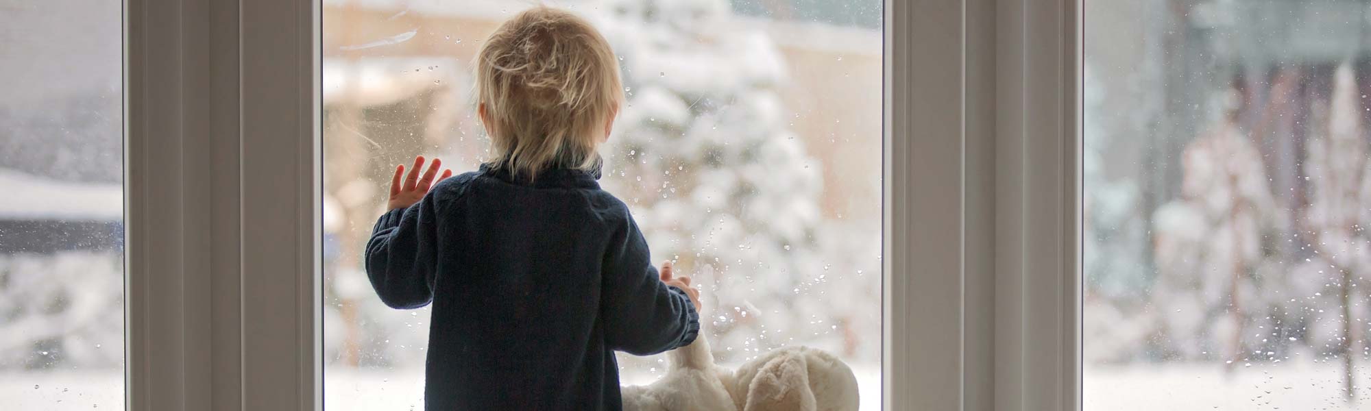 Toddler Looking At Snow