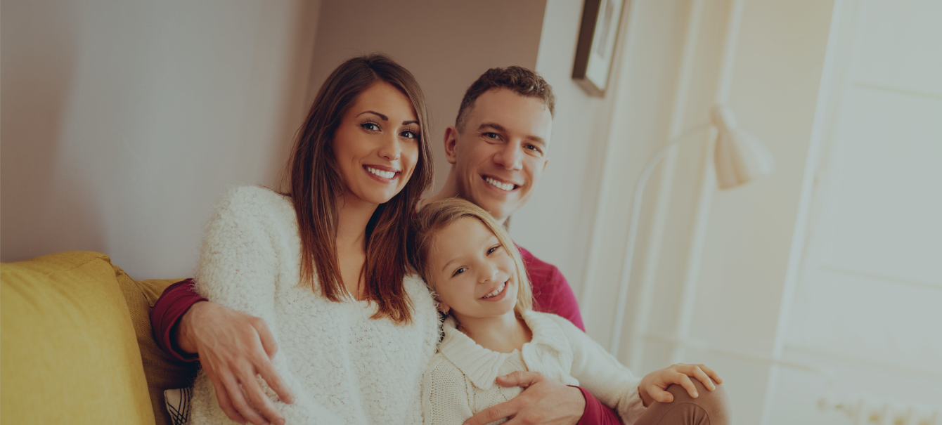 Family on couch Image