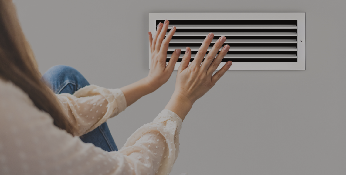 Warming Hands By Vent Image