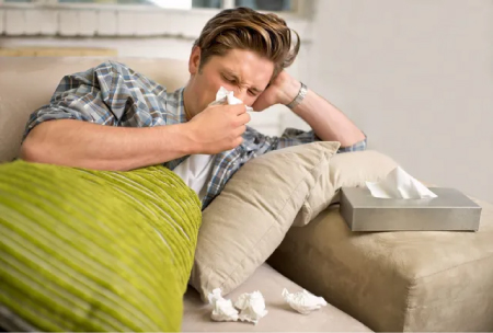 Man Sneezing Allergies