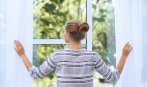Woman by window